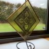 Yellow Stained Glass Pane on Stand